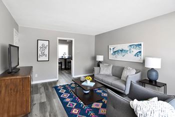 A living room with a couch and a coffee table